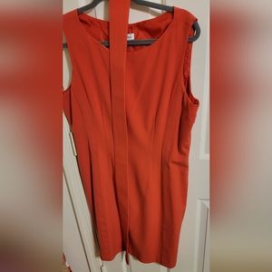 Calvin Klein size 14 sheath dress with matching belt orange in color